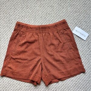 Athleta Echo Shorts Size 10 Rust Paprika Pockets Breathable NEW